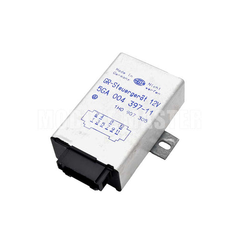 Hella Cruise Control Module with Made in Germany and other identifying labels on the front. For Audi, Land Rover, Saab, and Volkswagon vehicles.