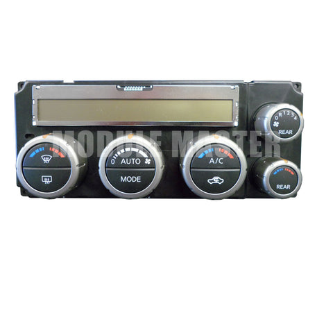 Nissan Pathfinder climate control panel with five climate related knobs and a rectangular screen across the top of the panel.