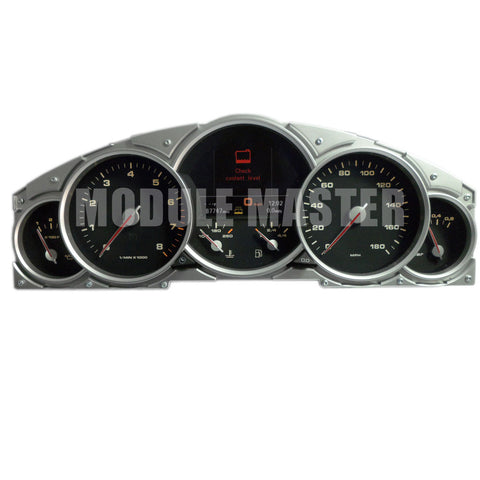 Porsche Cayenne Instrument Cluster with various gauges and a screen in the center of the gauge.